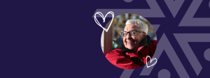 Woman in red coat smiles. Graphic hearts frame the image.