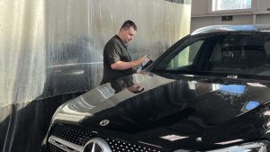 Jeff shining up a vehicle at Mercedes-Benz Winnipeg